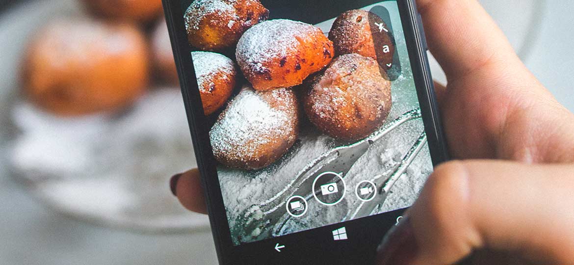 Person Taking Photo on Smartphone